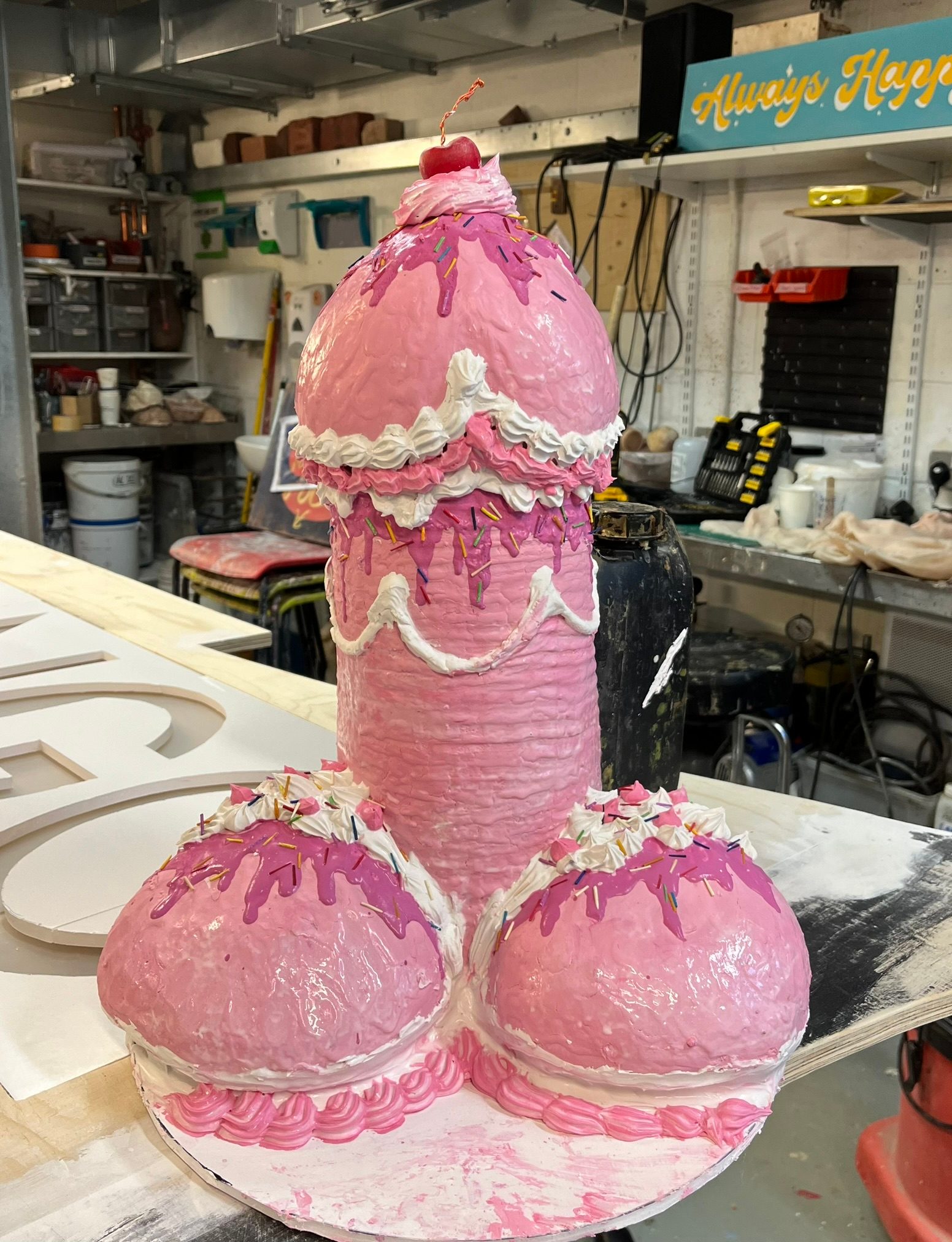 A picture of a prop cake in the shape of a penis.