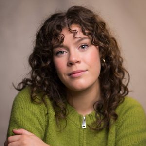 Daisy is looking at the camera.