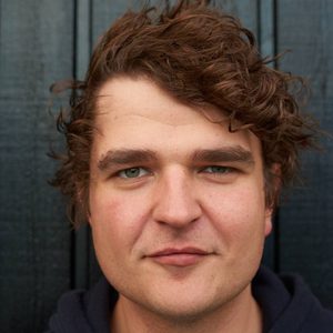 Davud is looking at the camera