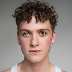 Hudson is looking at the cmaera.