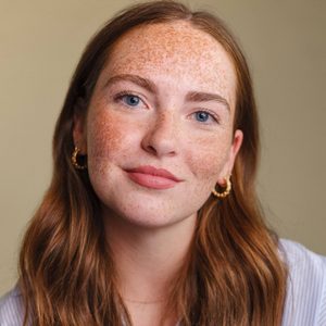 Jorgey is smiling at the camera.