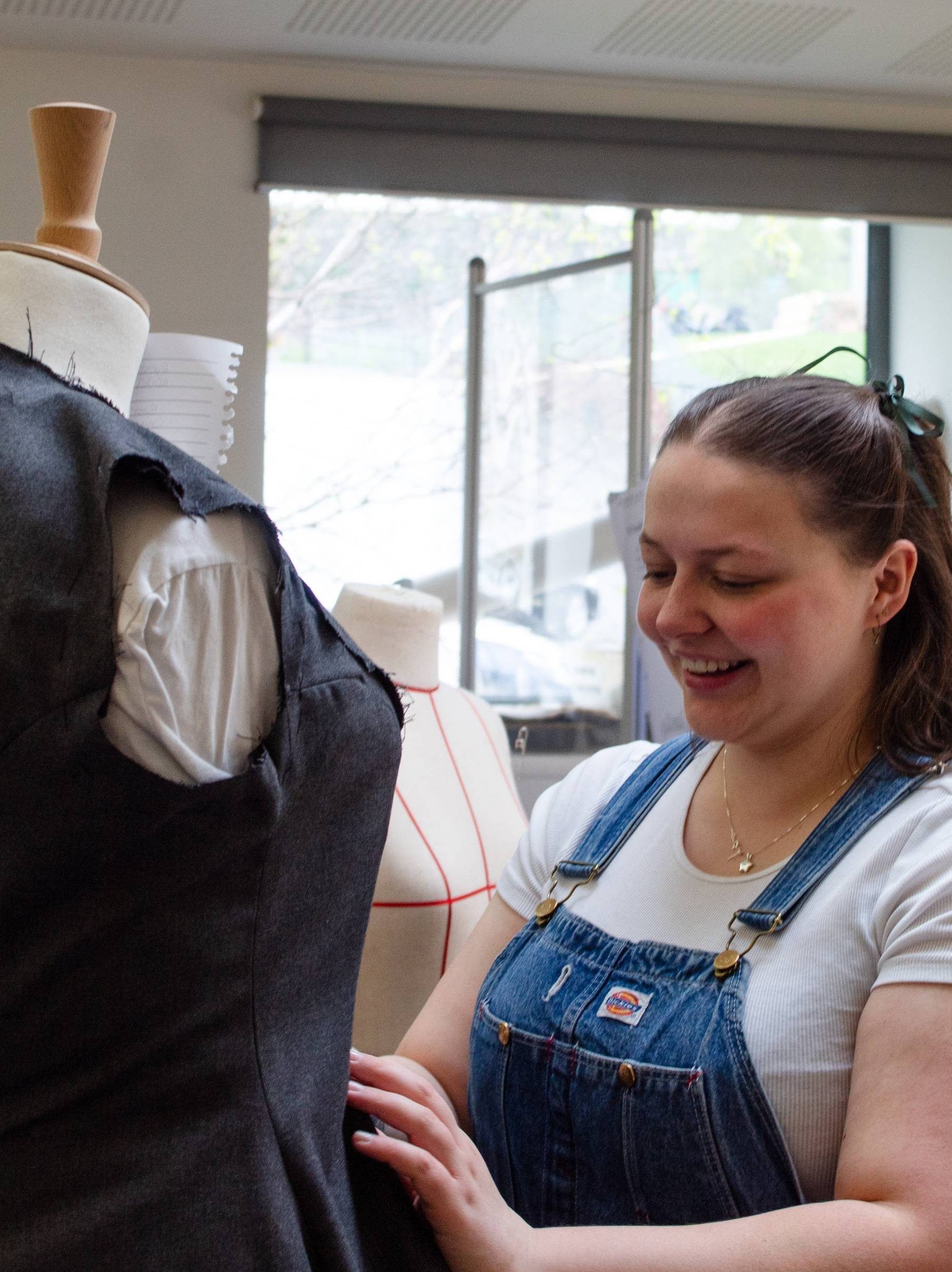 Murron is working on a costume.