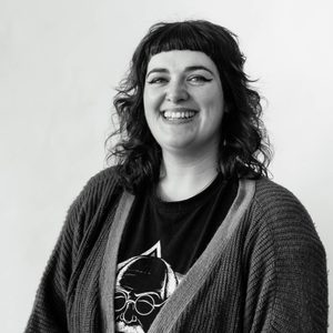 Lauren is smiling at the camera.