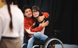 Two BA Performance students embrace in a rehearsal for the Christmas Carol production